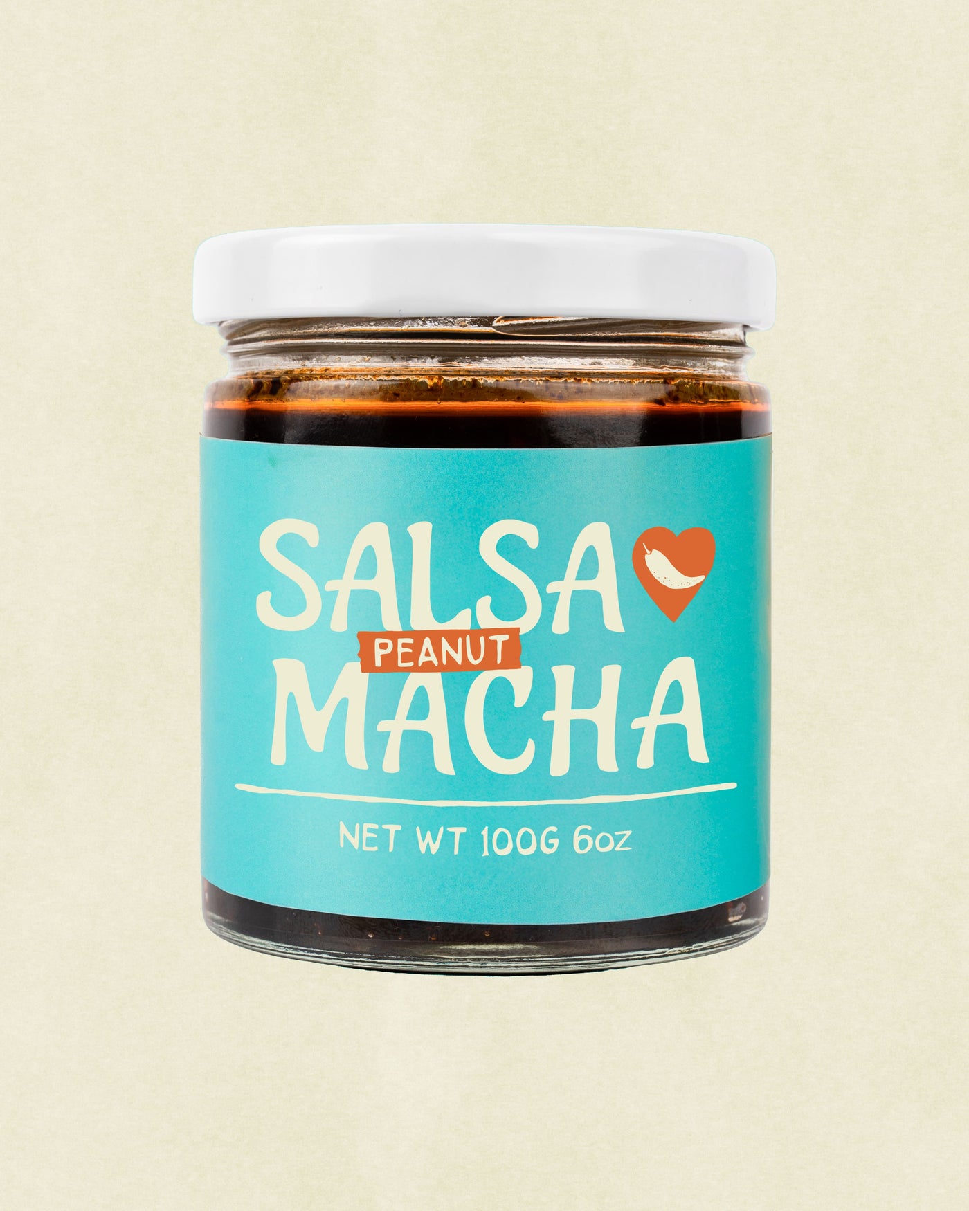 Front view of Veracruz All Natural Peanut Macha jar with label displayed on a beige background